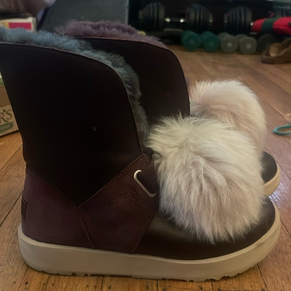 ugg puff ball worn twice size 8 just a little tight on me.